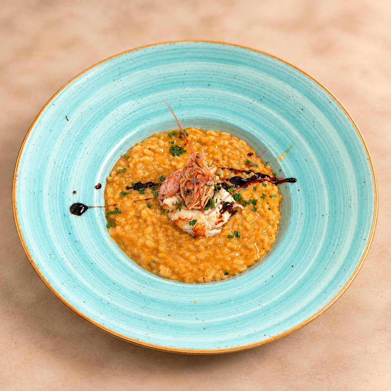 Risotto con langostinos caramelizados